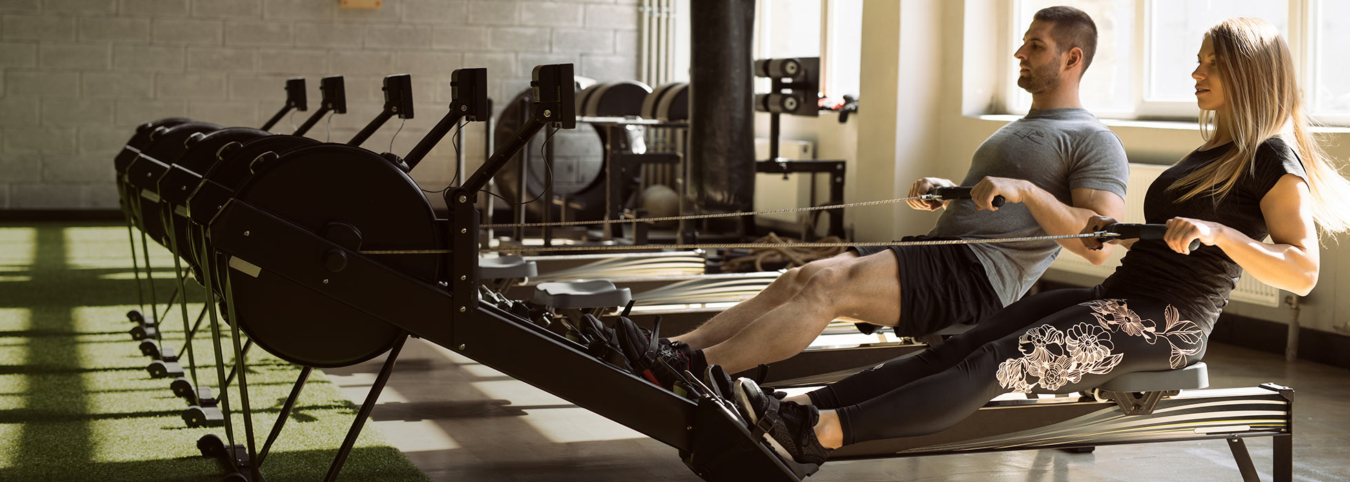 Couples Working Out At Gym Near Me On Cardio Workout Day